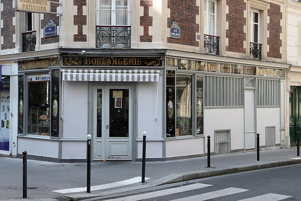 The painted shopfront of an old Paris bakery on rue Montgallet